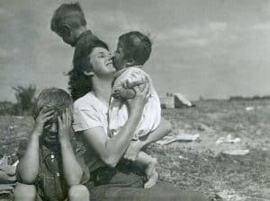 Mary Kelly on the beach on Ireland with sons